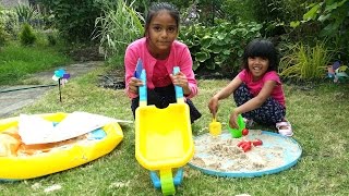 childrens wheelbarrow and garden tool set